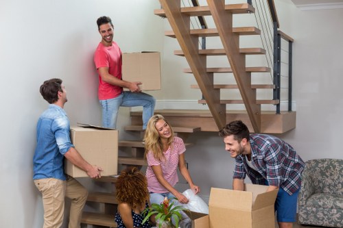 Removal company team in Chelsea reviewing modern slavery compliance policies