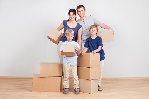 Removal company team following safety procedures during a move