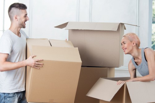 Staff discussing risk controls during a removals job