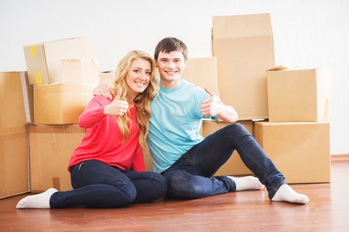 Movers handling access challenges in a Chelsea townhouse street