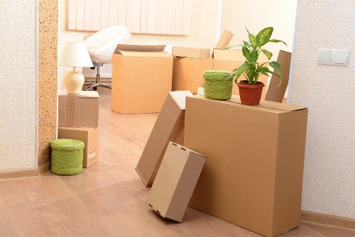 Packed household boxes and furniture for a Chelsea move
