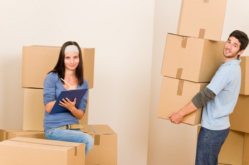 Loading furniture into a removals van in Chelsea
